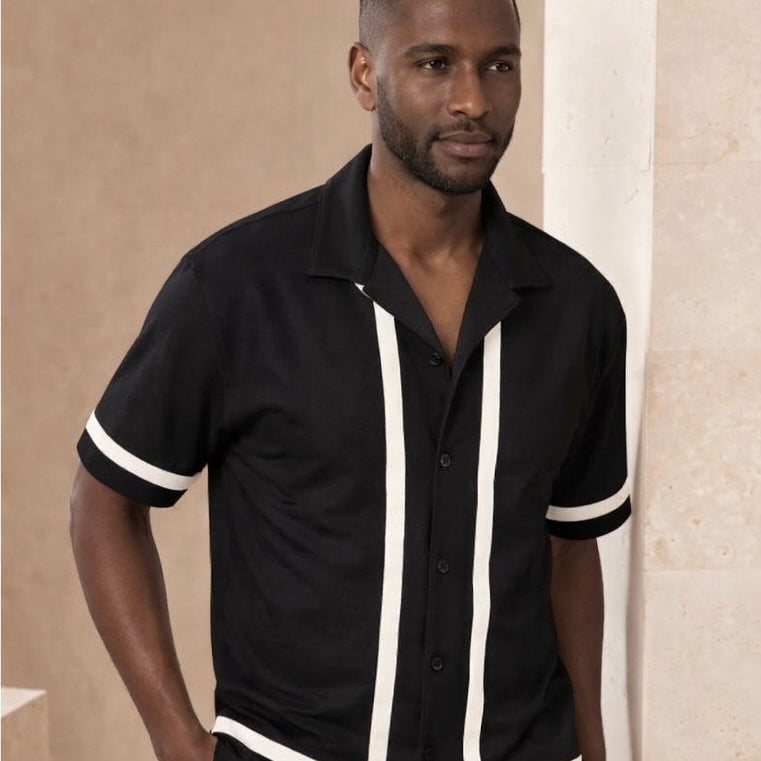 Man wearing a black shirt with white trim .Perfect Statement shirt