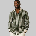 Man wearing a green and white striped shirt 