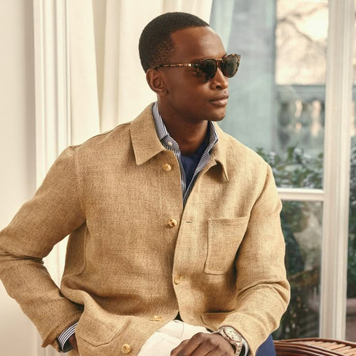 Man wearing a beige linen jacket